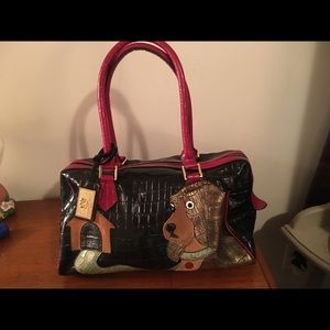 Sharif dog and dog house leather hand bag